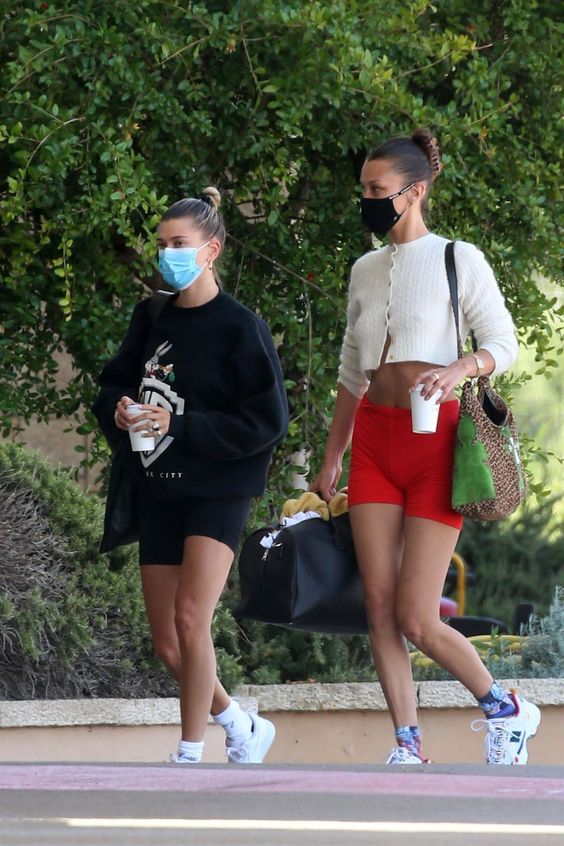 3 SWEATSHIRT OUTFITS TO TRANSITION INTO FALL - Hailey Bieber sweatshirt with biker shorts